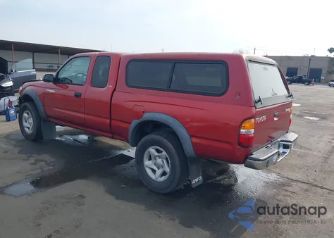 2002 Toyota Tacoma из США, поврежденный, VIN 5TEWM72NX2Z121069